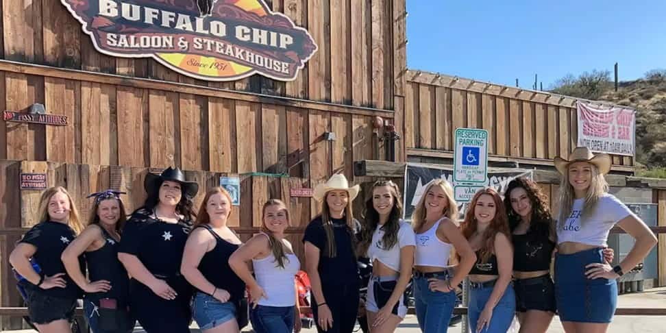 Women outside Buffallo Chip Saloon & Steakhouse in Scottsdale AZ.