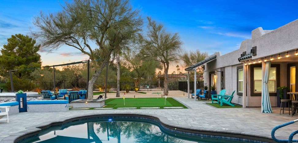 pool and golf outside of a vacation renal in Scottsdale