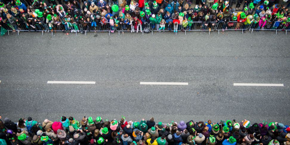 Crowds awaiting the beginning on a St. Patrick's Day parade.