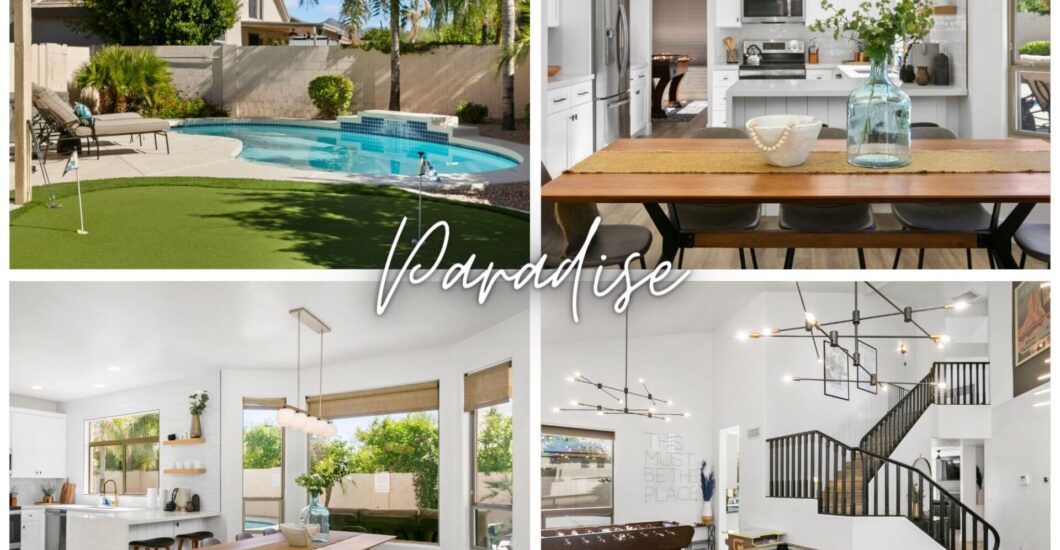 A game room with a pool table and a stairway.